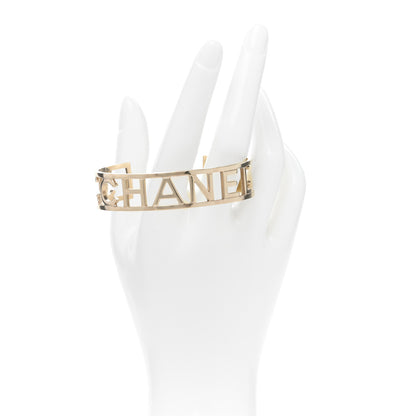 Chanel Metal Logo Cuff Bracelet Gold 2 of 5