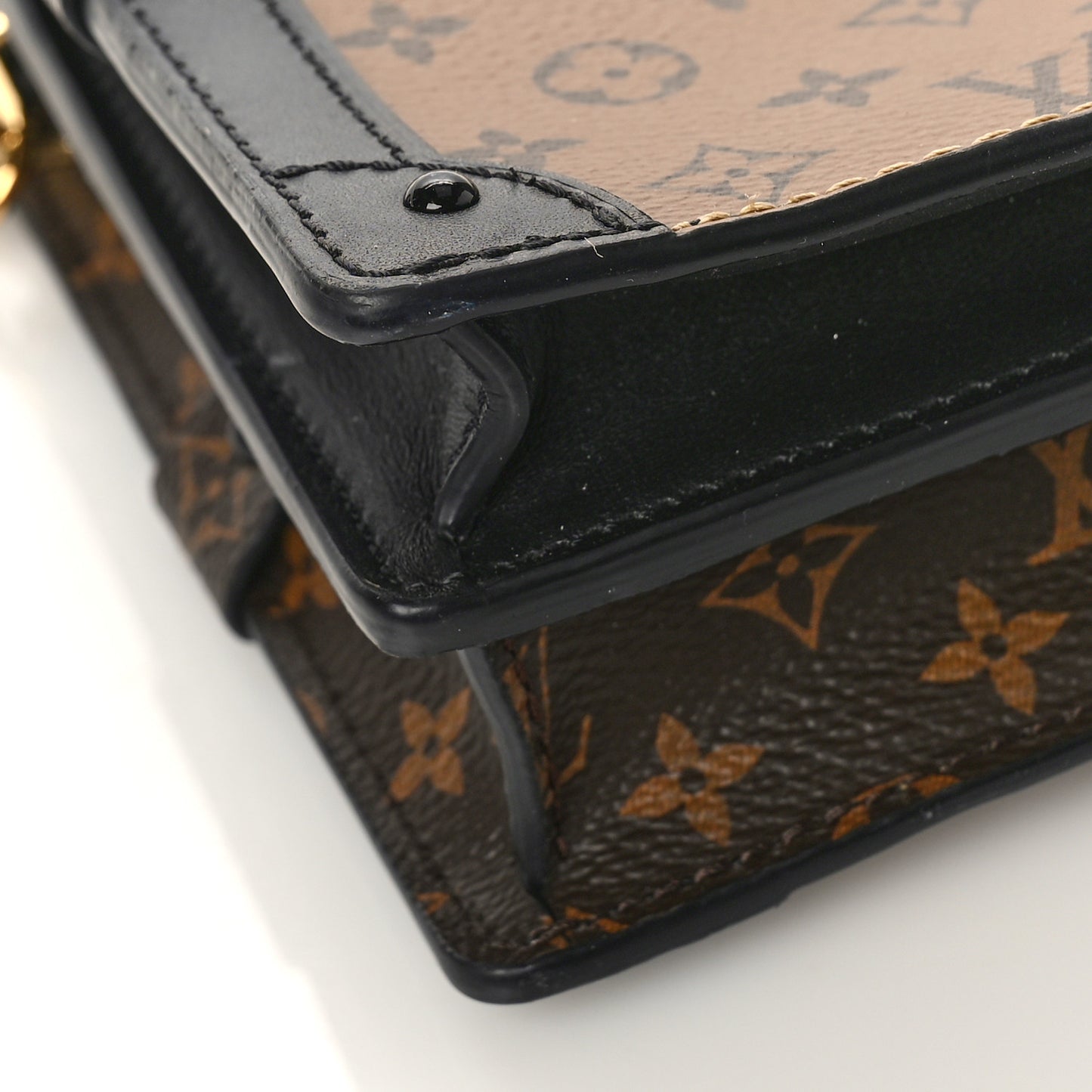 Reverse Monogram Trunk Clutch
