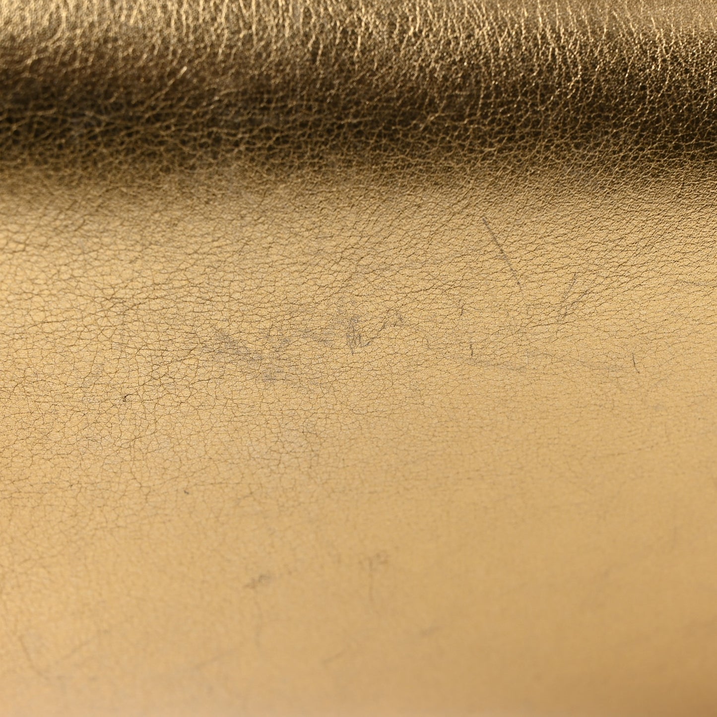 LOUIS VUITTON Metallic Calfskin Louise Clutch Gold