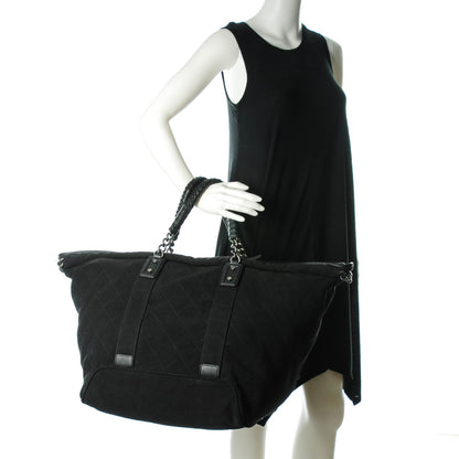 Chanel Canvas Street Style Travel Bag 2 of 8