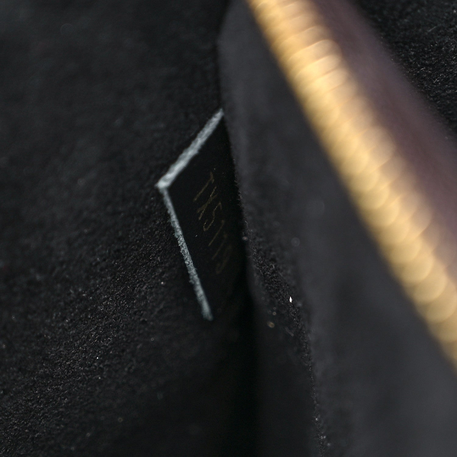close up product image of interior date code for Louis Vuitton monogram Neonoe bag FASHIONPHILE