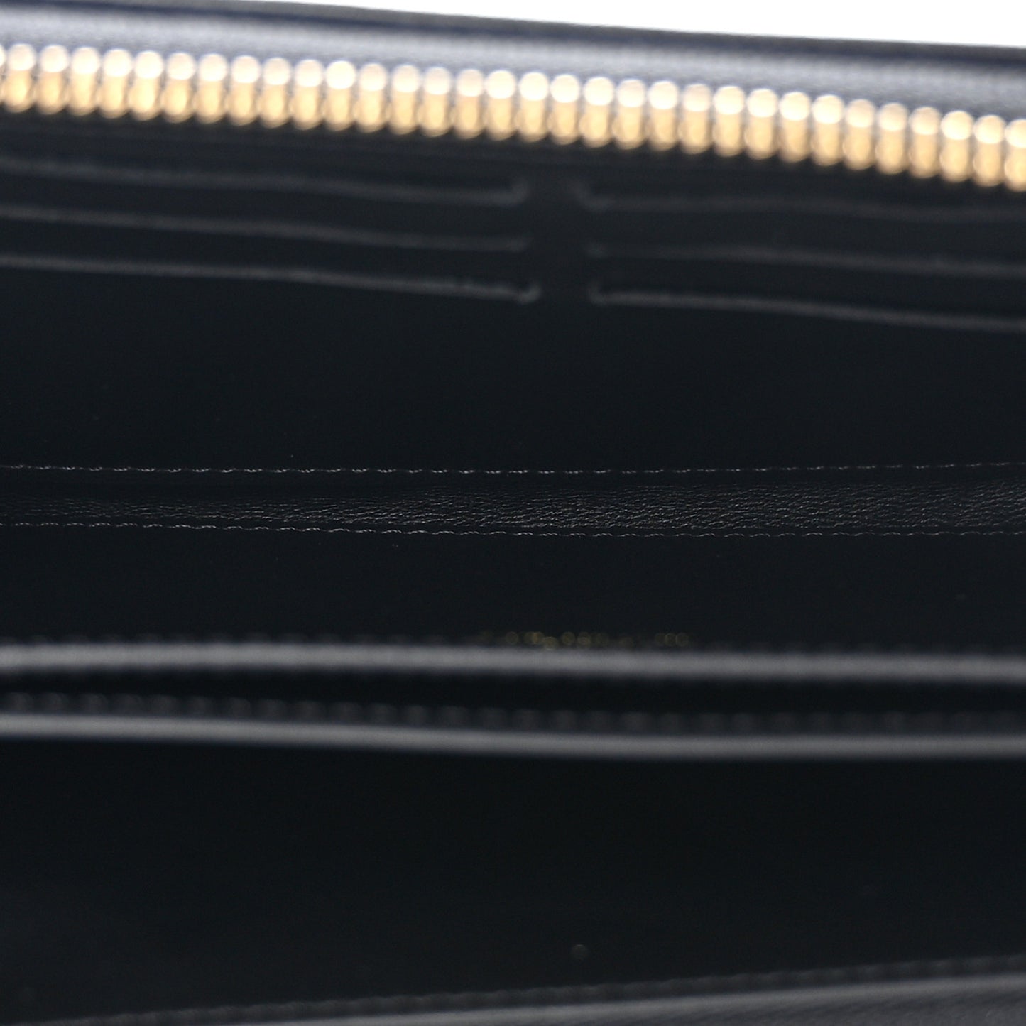 Lambskin Embossed Monogram Coussin Zippy Wallet Black