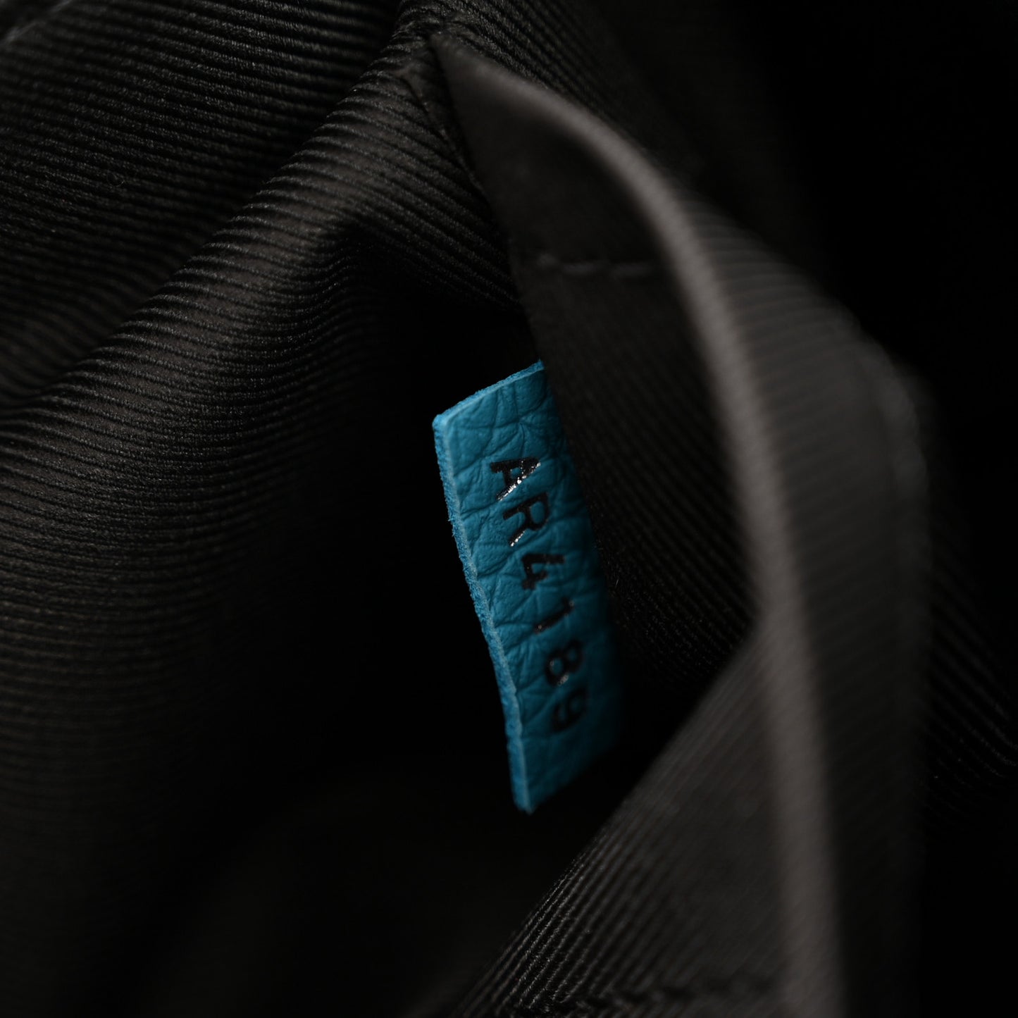 Taurillon Monogram Triangle Messenger Turquoise