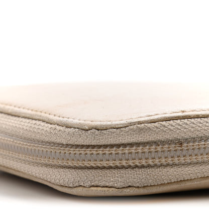 Chanel Lambskin Camellia Embossed Zip Around Organizer Wallet Light Beige 12 of 23