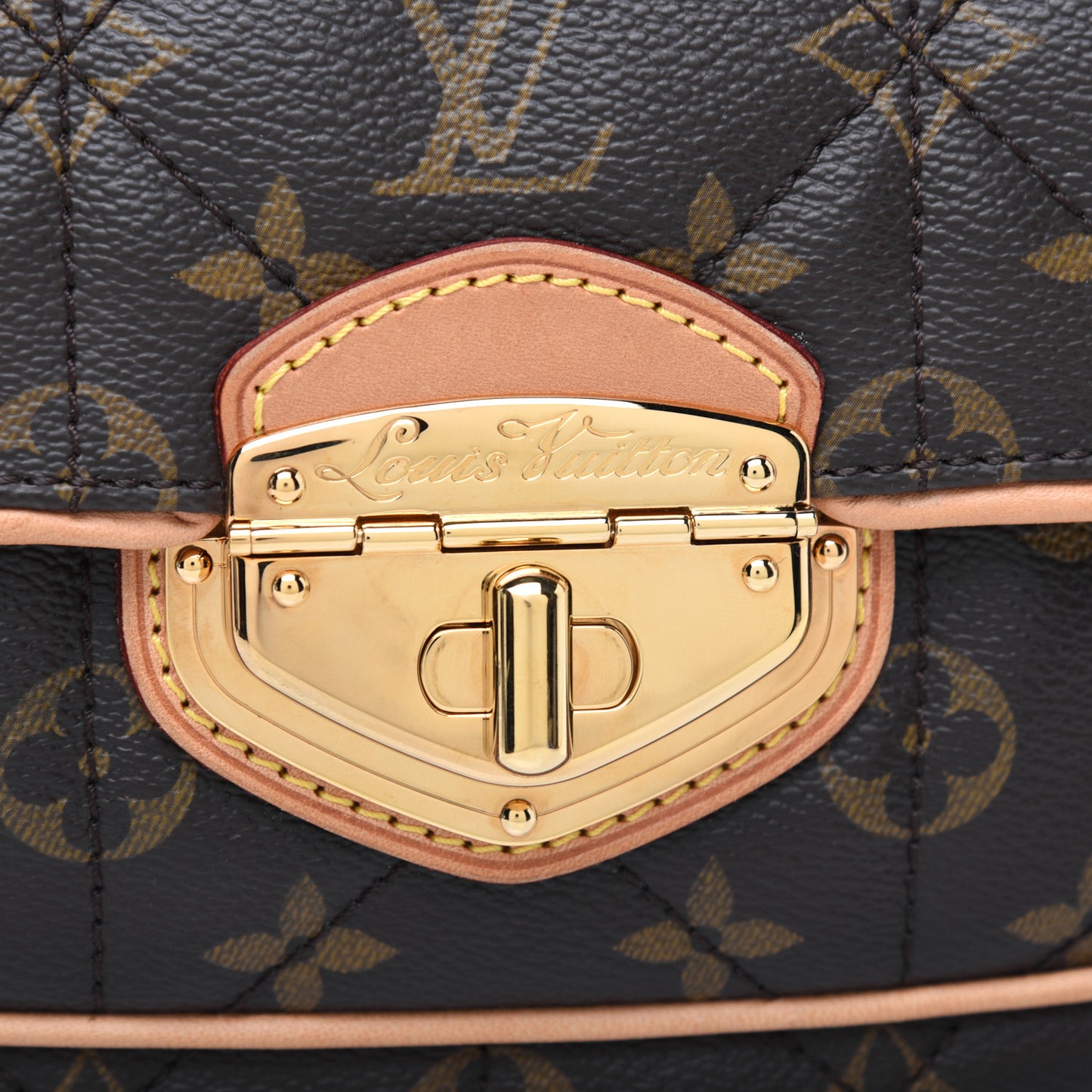 Monogram Etoile Clutch