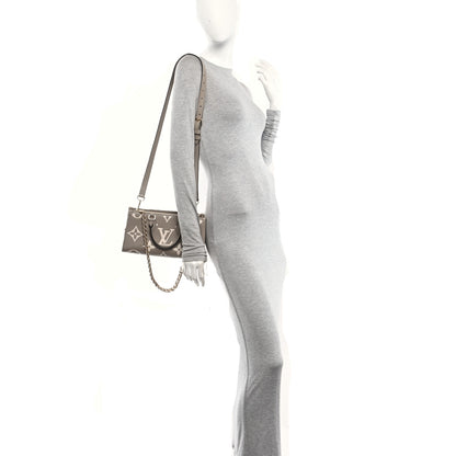 Louis Vuitton Empreinte OnTheGo East West Dove Cream 2 of 11