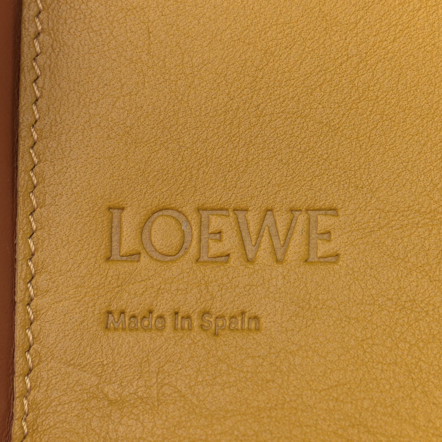 Buffed Calfskin Logo Embossed Small Heel Pouch Tan
