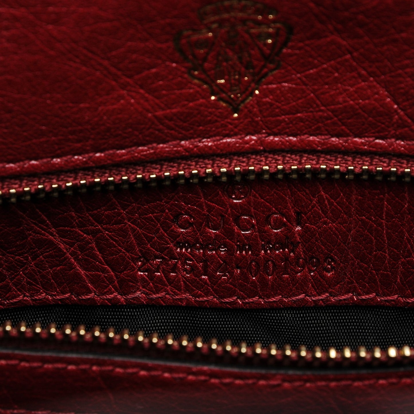 Ostrich Stirrup Top Handle Bag Raspberry
