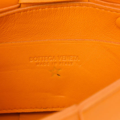 Bottega Veneta Lambskin Maxi Intrecciato Extra Mini Cassette Crossbody Bag Tangerine 6 of 10
