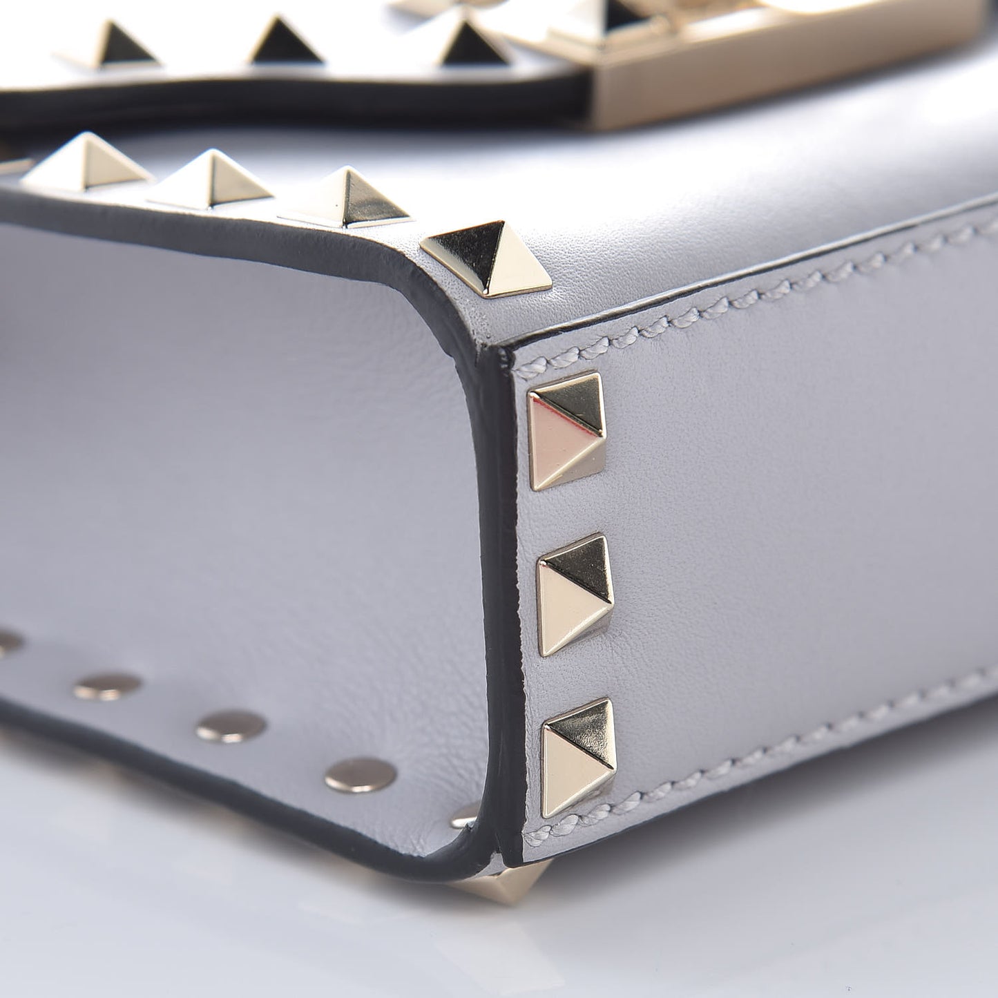 Vitello Mini Rockstud Flip Lock Crossbody Bag Pastel Grey