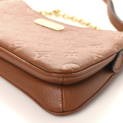 Louis Vuitton Empreinte Monogram Liv Pochette Cognac 10 of 11