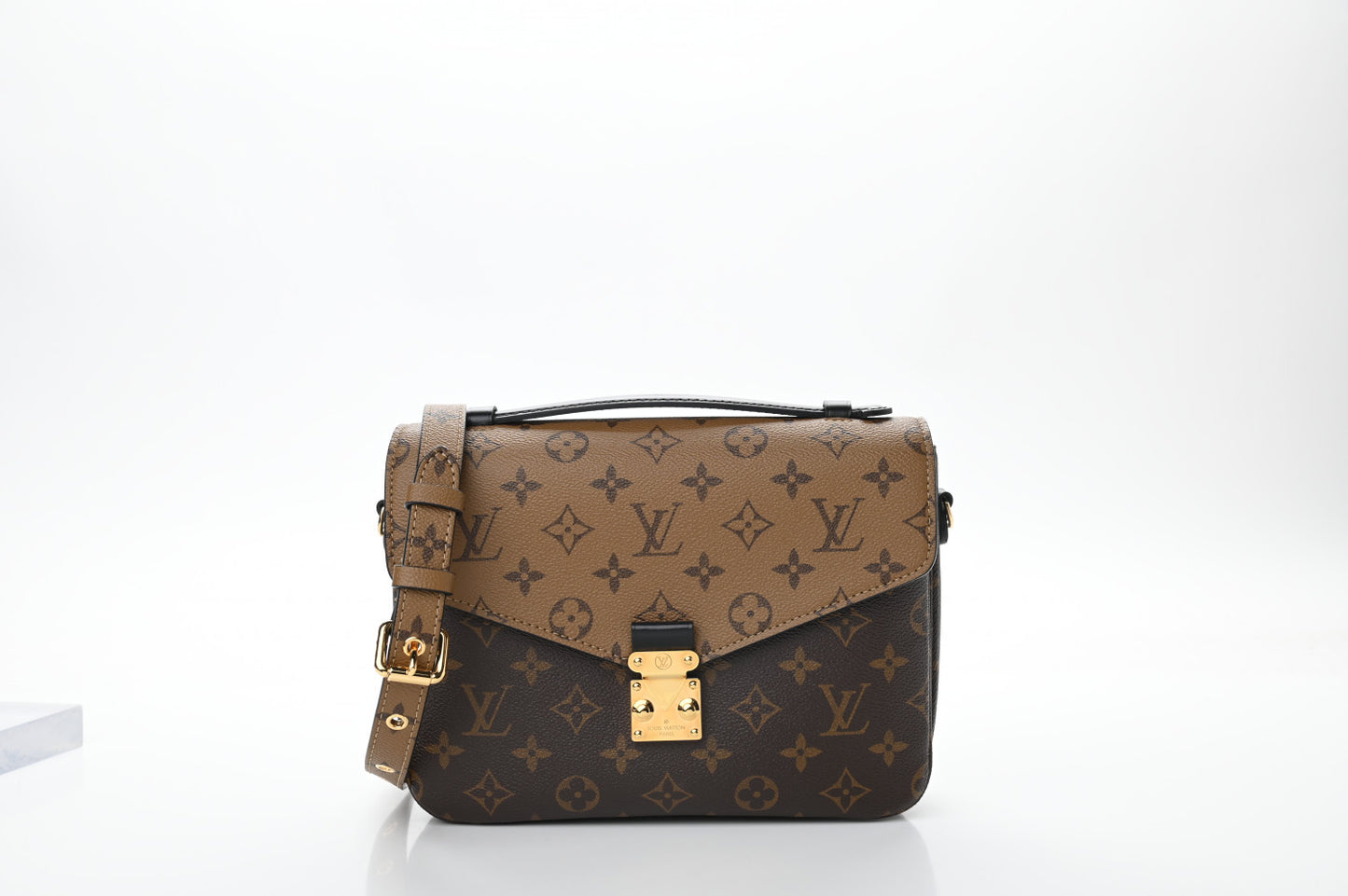 Reverse Monogram Pochette Metis