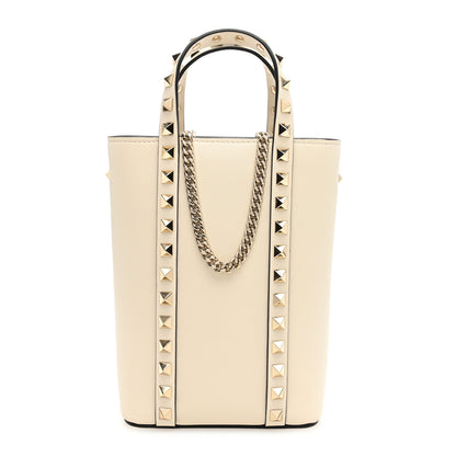 Valentino Garavani Pebbled Calfskin Rockstud North South Crossbody Bag Light Ivory 1 of 9