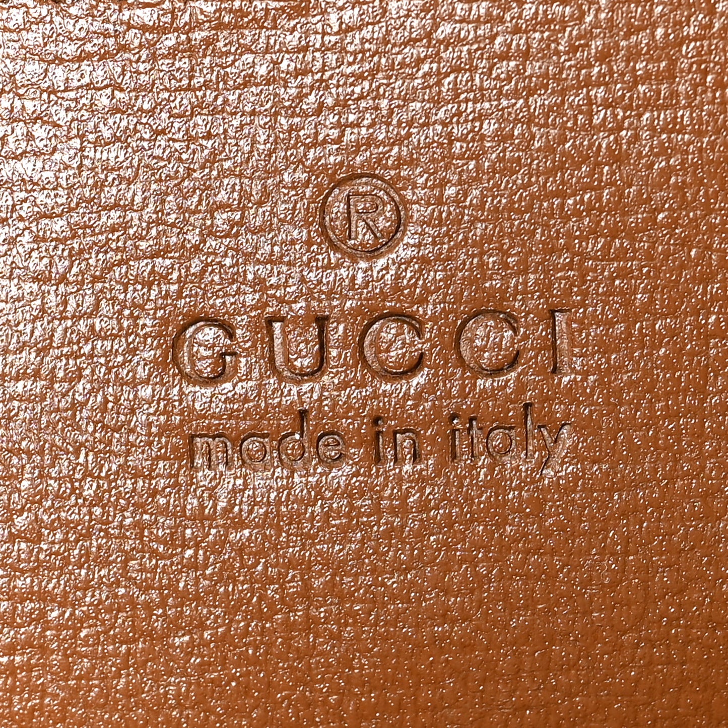 GG Supreme Monogram Sling Backpack Brown