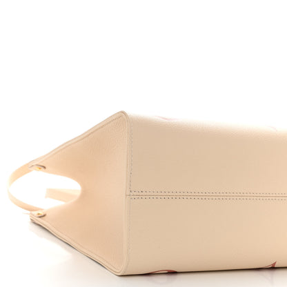 Louis Vuitton Empreinte Monogram Giant Onthego MM Creme Rose Trianon 8 of 9