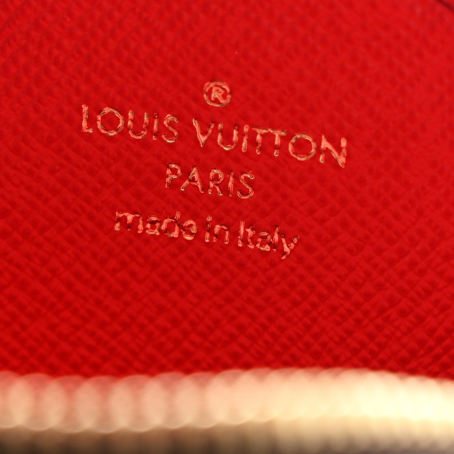 Monogram OnTheGo East West Round Coin Purse Red