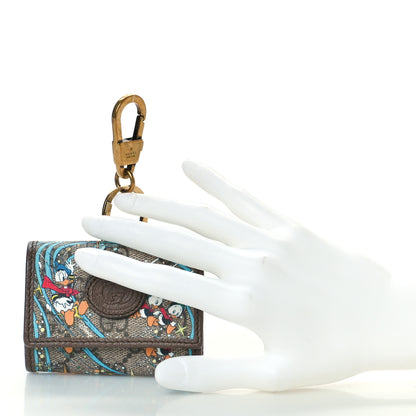 Gucci X DISNEY GG Supreme Monogram Donald Duck Interlocking G Key Pouch Beige Multicolor New Acero 2 of 9