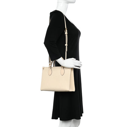 Louis Vuitton Empreinte Monogram Giant Onthego PM Cream Beige 2 of 9