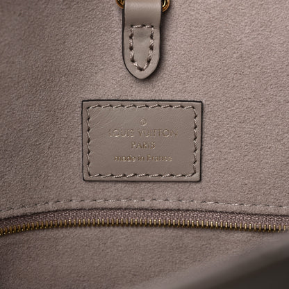 Louis Vuitton Empreinte Monogram Giant Onthego MM Tourterelle Creme 6 of 19