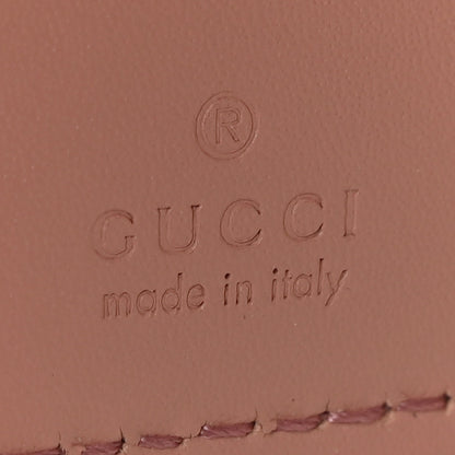 Gucci Gilbert Calfskin Jumbo GG Embossed Tri-Fold Wallet 6 of 8