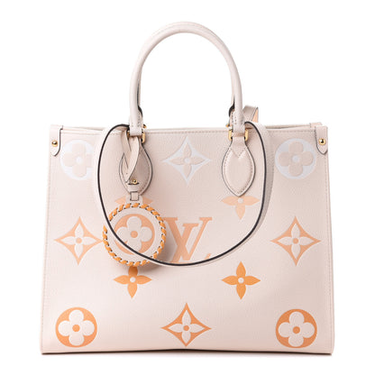 Louis Vuitton Empreinte Monogram Giant By The Pool Onthego MM Cream Saffron 1 of 4
