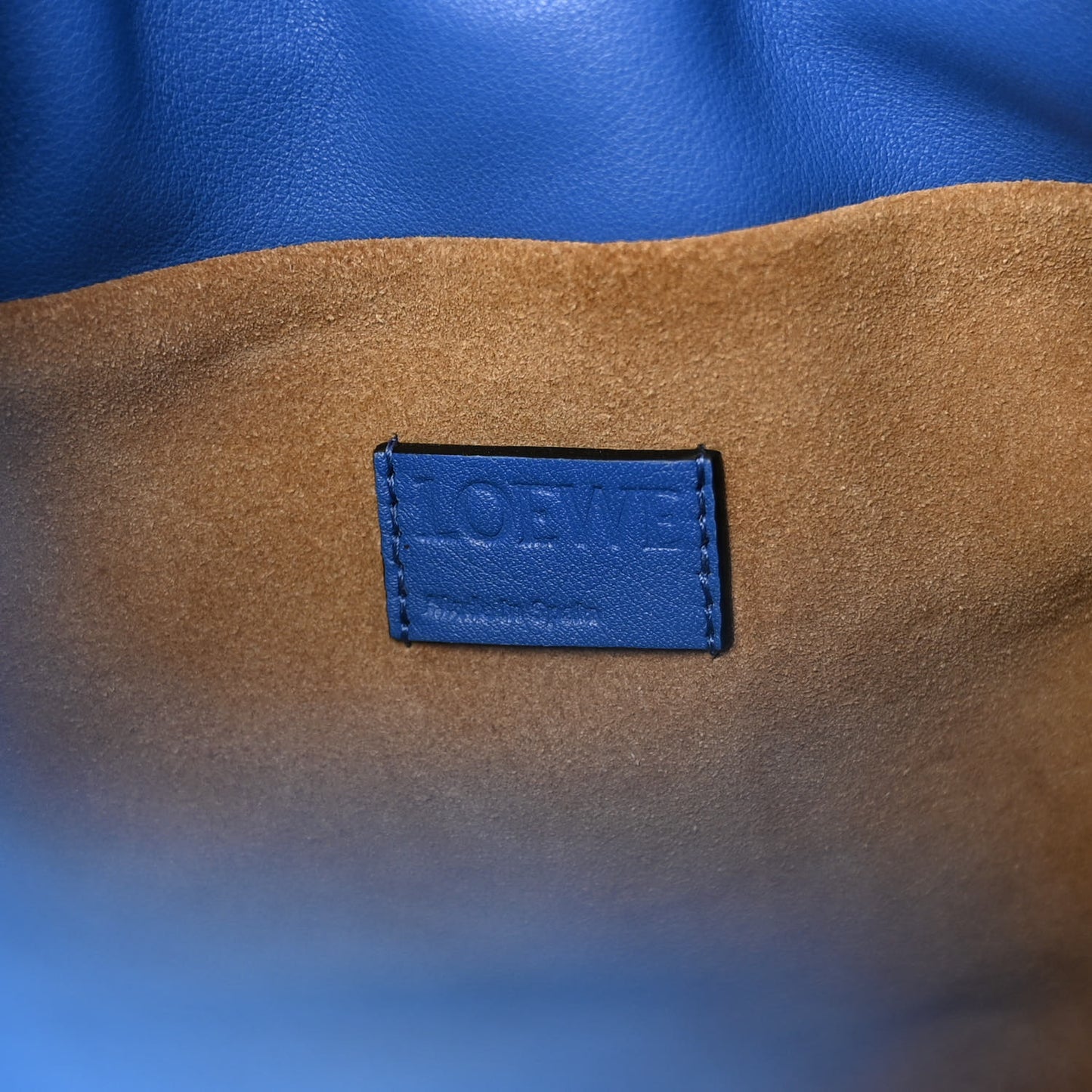Nappa Shearling Flamenco Knot Clutch Blue
