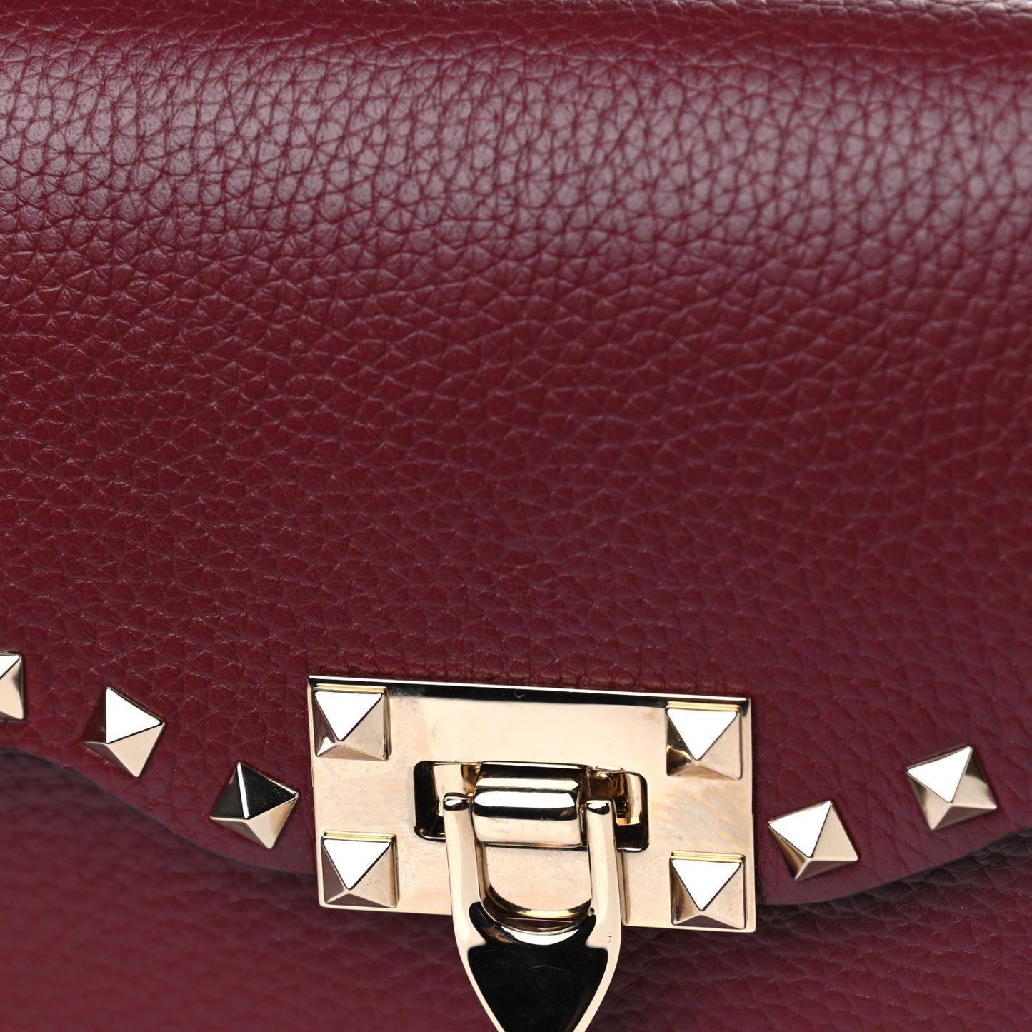 Pebbled Calfskin Medium Rockstud Flip Lock Crossbody Bag Rubin
