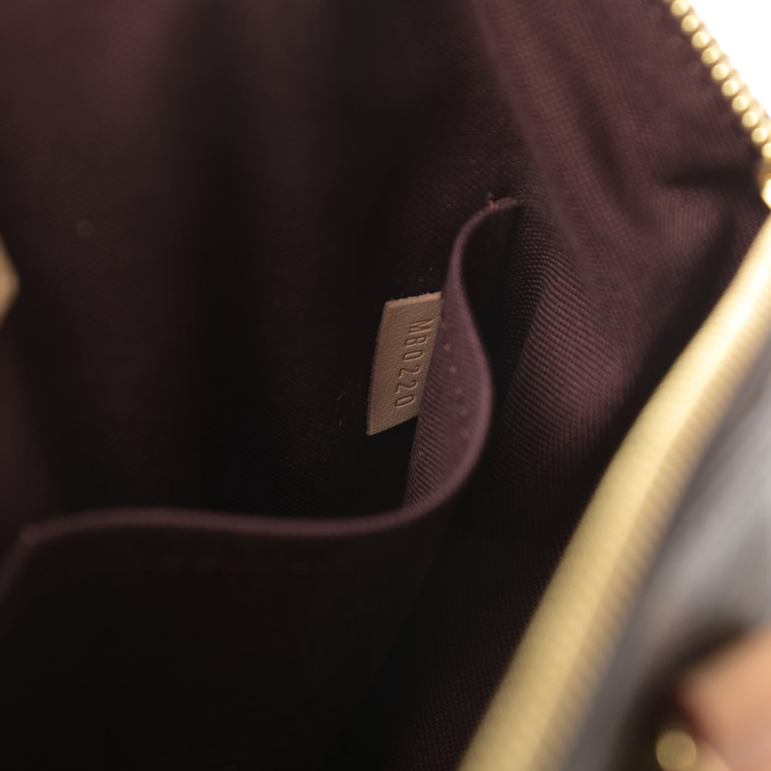 Louis Vuitton Monogram Rivoli MM 7 of 12