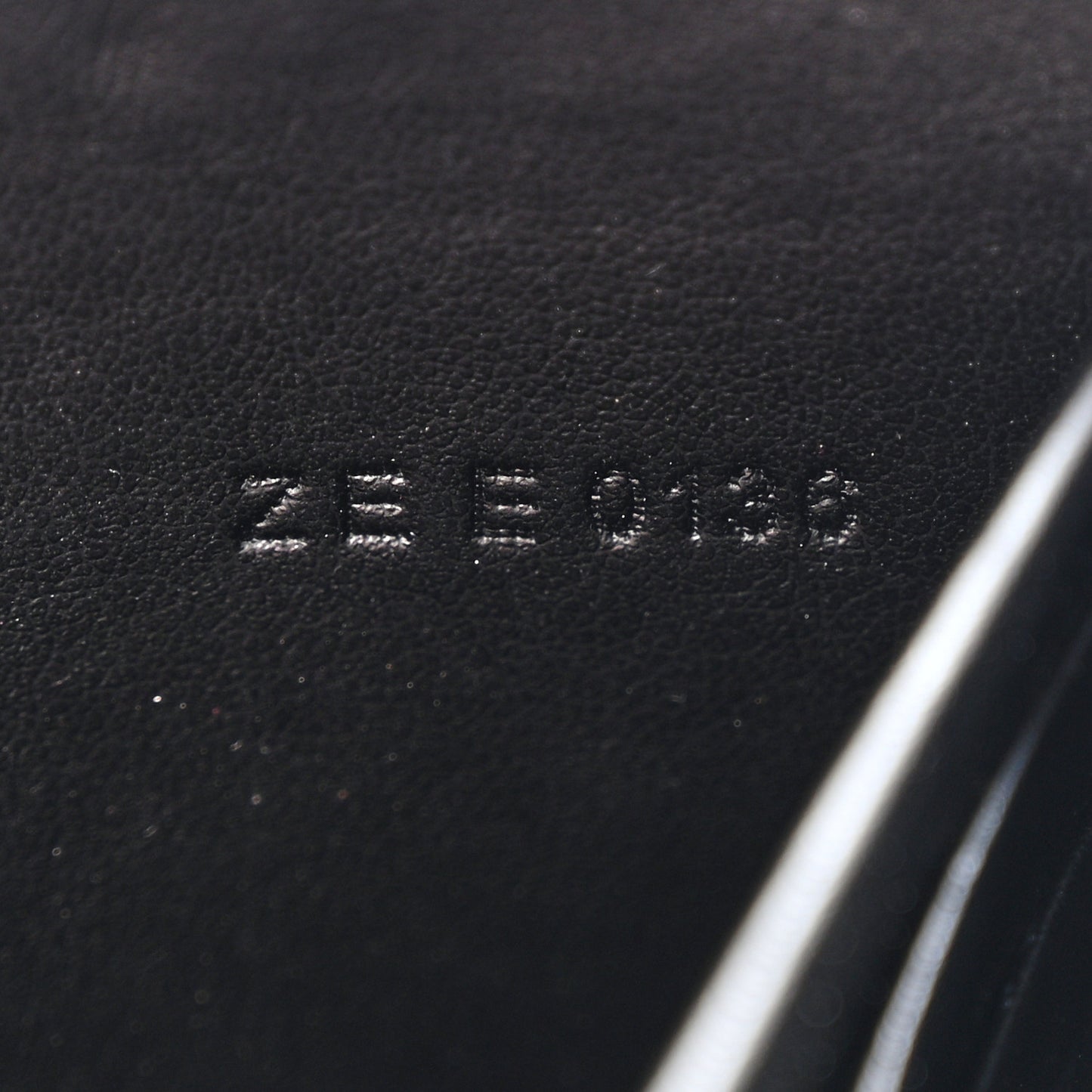 Calfskin Logo Star Embossed Zip Around Wallet Black