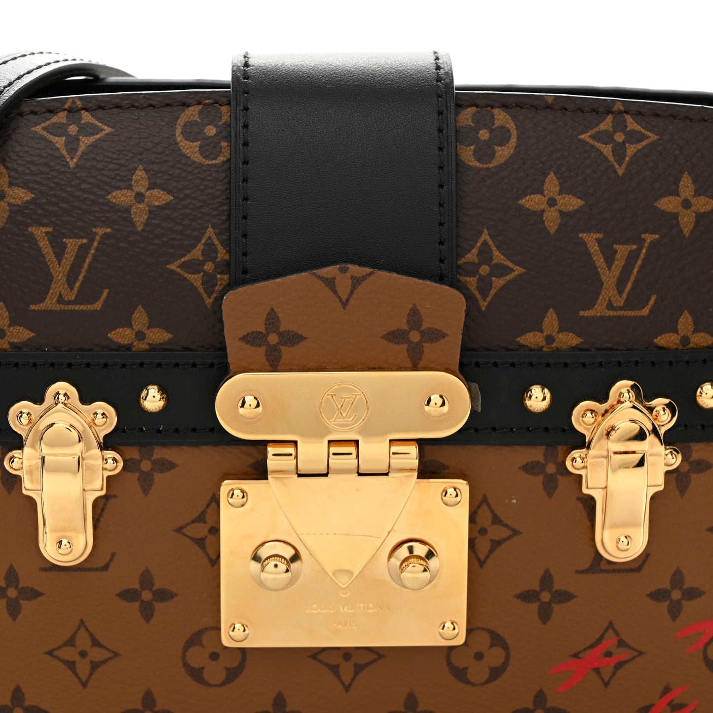 Reverse Monogram Trunk Clutch
