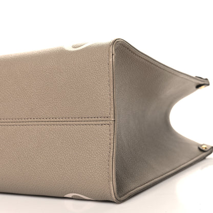 Louis Vuitton Empreinte Monogram Giant Onthego MM Tourterelle Creme 9 of 11