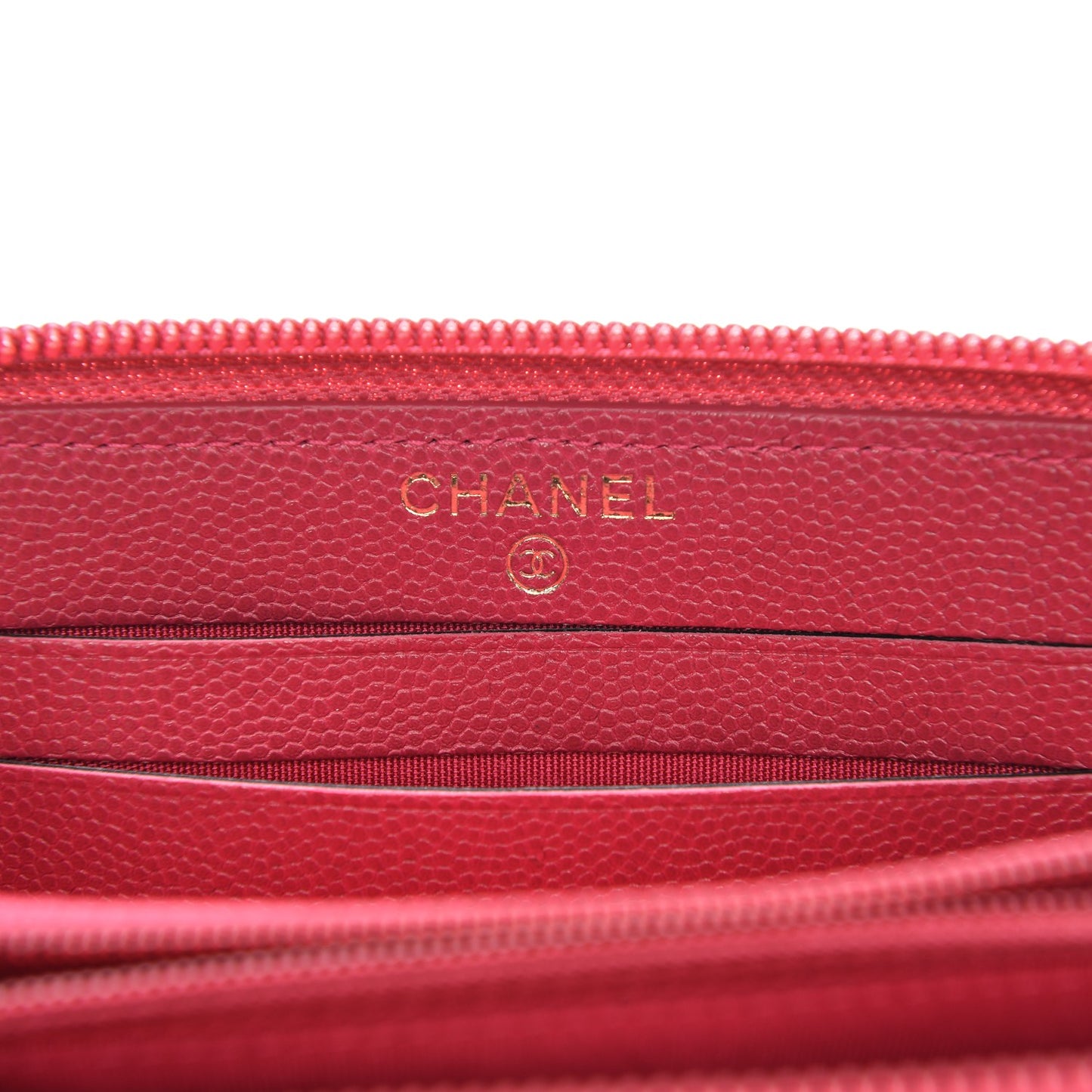 Caviar Quilted Small Boy Zip Around Wallet Fuchisa