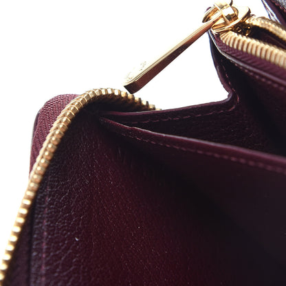 Louis Vuitton Ostrich Zippy Wallet Prune 7 of 9