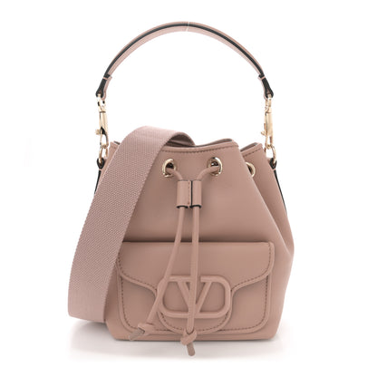 Valentino Garavani Calfskin Vlogo Small Loco Drawstring Bucket Bag Rose Cannelle 1 of 10