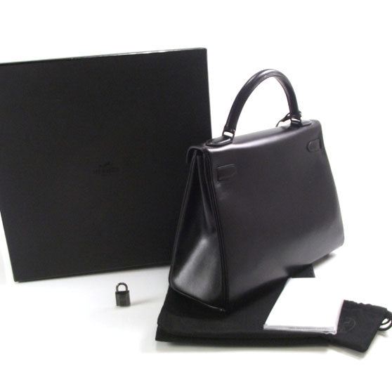 Box Kelly 32 Retourne So Black