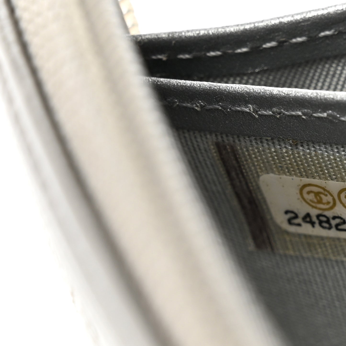 Metallic Caviar Quilted Boy Zip Around Wallet Silver