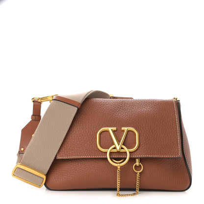 Valentino Garavani Pebbled Calfskin Small VRing Shoulder Bag Saddle Brown 1 of 9