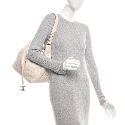 Chanel Glazed Calfskin On The Road Drawstring Tote Ivory 2 of 9