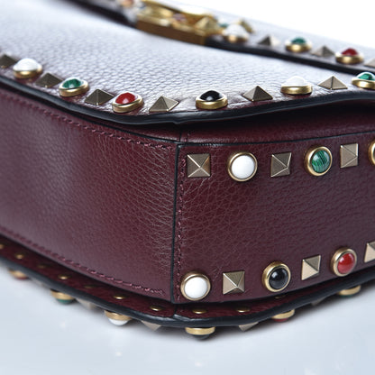 Valentino Garavani Pebbled Calfskin Medium Rockstud Rolling Flap Saddle Bag Rubin 8 of 9
