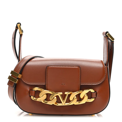 Valentino Garavani Calfskin Small Vlogo Chain Shoulder Bag Saddle Brown 1 of 9