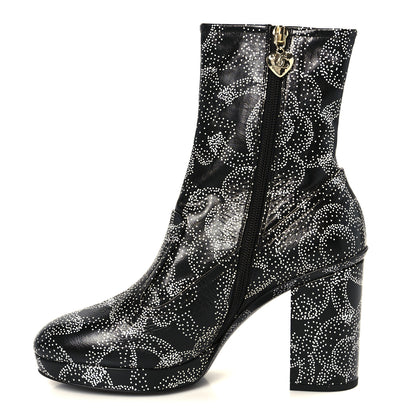 Chanel Calfskin Camellia Printed Ankle Boots 39 Black White 1 of 10