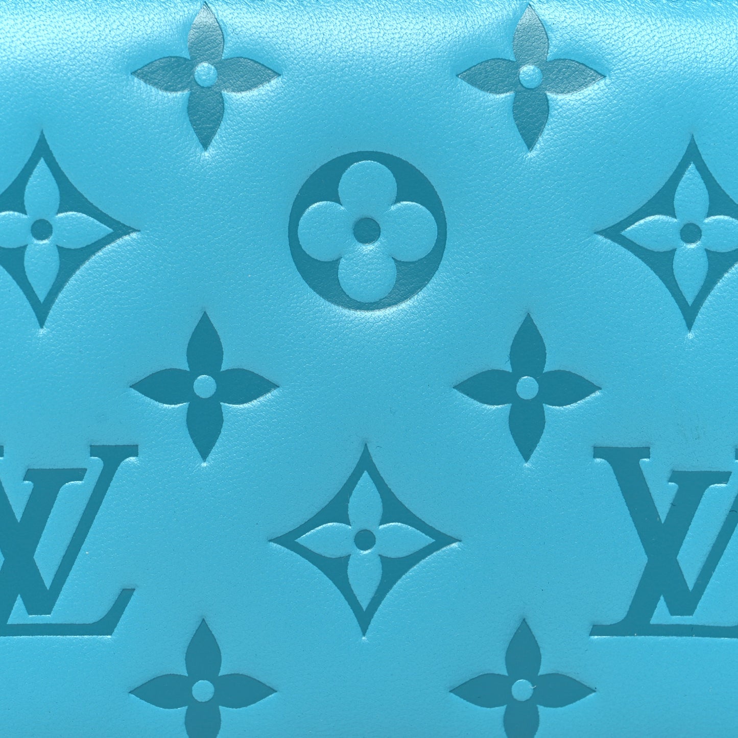 Lambskin Embossed Monogram Coussin Zippy Wallet Turquoise