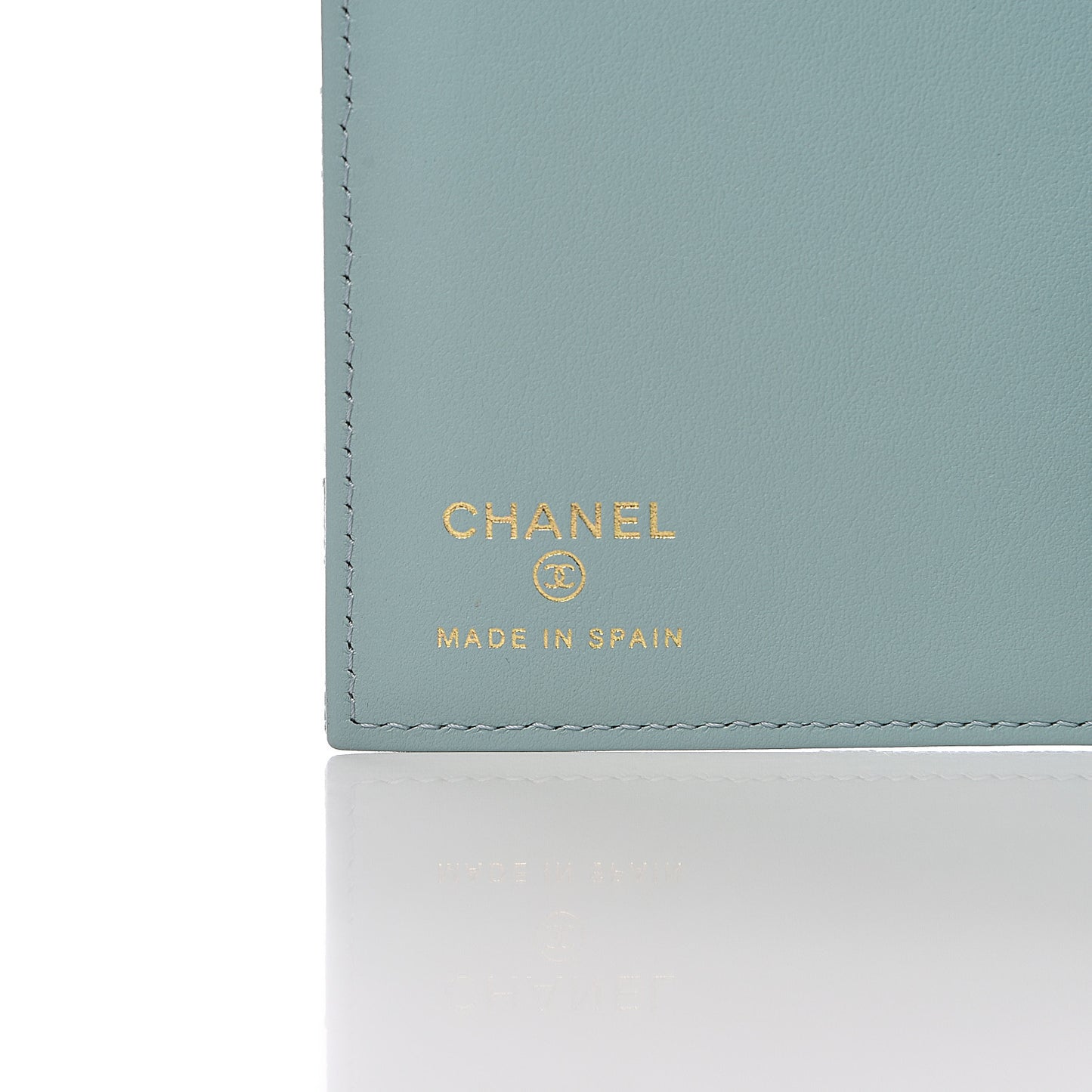 Caviar Quilted Passport Holder Blue