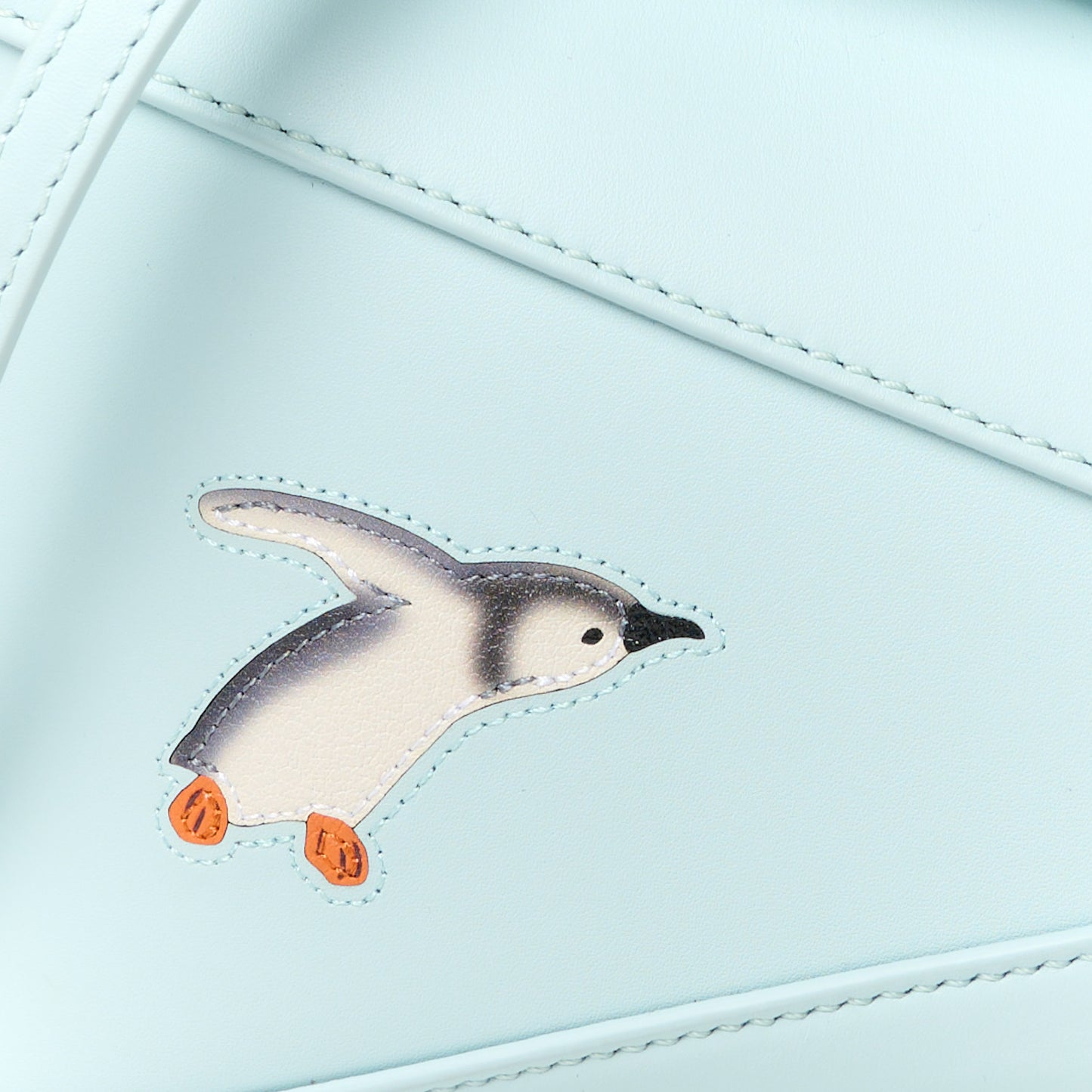 X SUNA FUJITA Shiny Calfskin Mini Penguin Puzzle Edge Bag Blue Iceberg