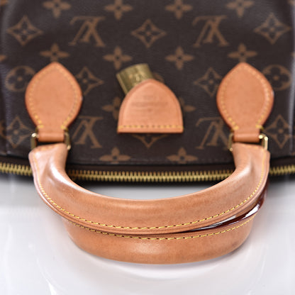 Louis Vuitton Monogram Rivoli PM 8 of 12