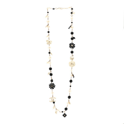 Chanel Pearl Enamel Resin Beaded Camelia CC Long Necklace Black White Gold 3 of 5