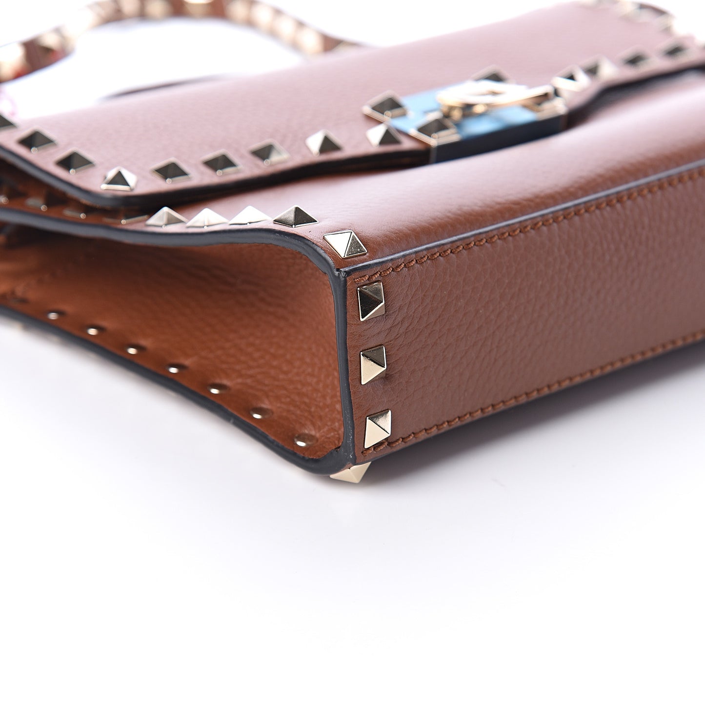 Pebbled Calfskin Medium Rockstud Flip Lock Crossbody Bag Bright Cognac