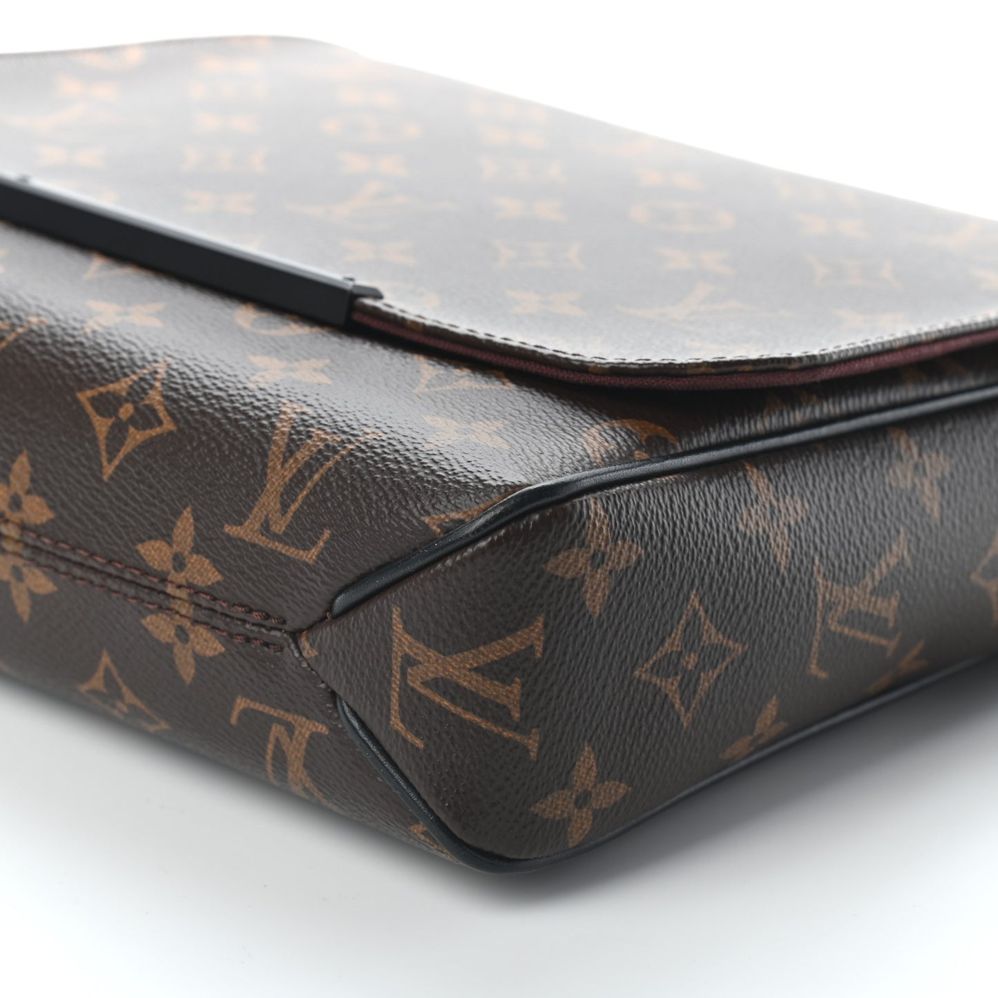 Monogram Macassar District PM