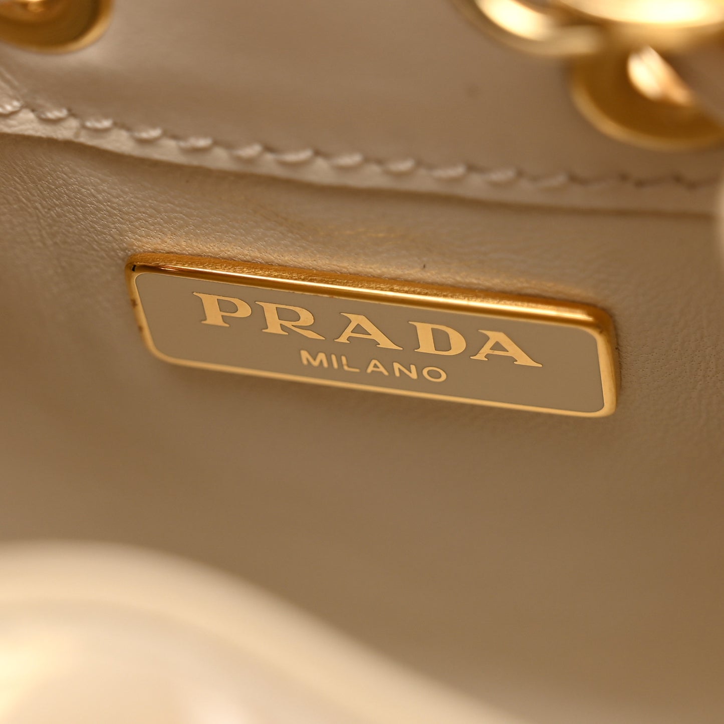 Vernice Metal Triangle Logo Mini Drawcord Pouch Shoulder Bag Avorio