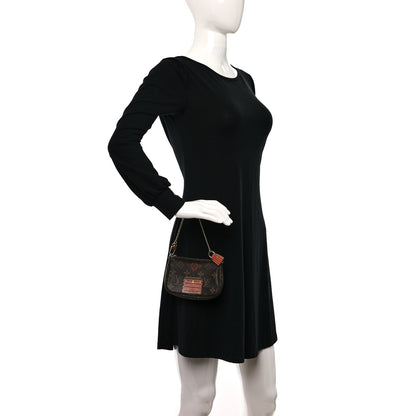 Louis Vuitton Monogram Trunks and Locks Mini Pochette Accessories 2 of 8
